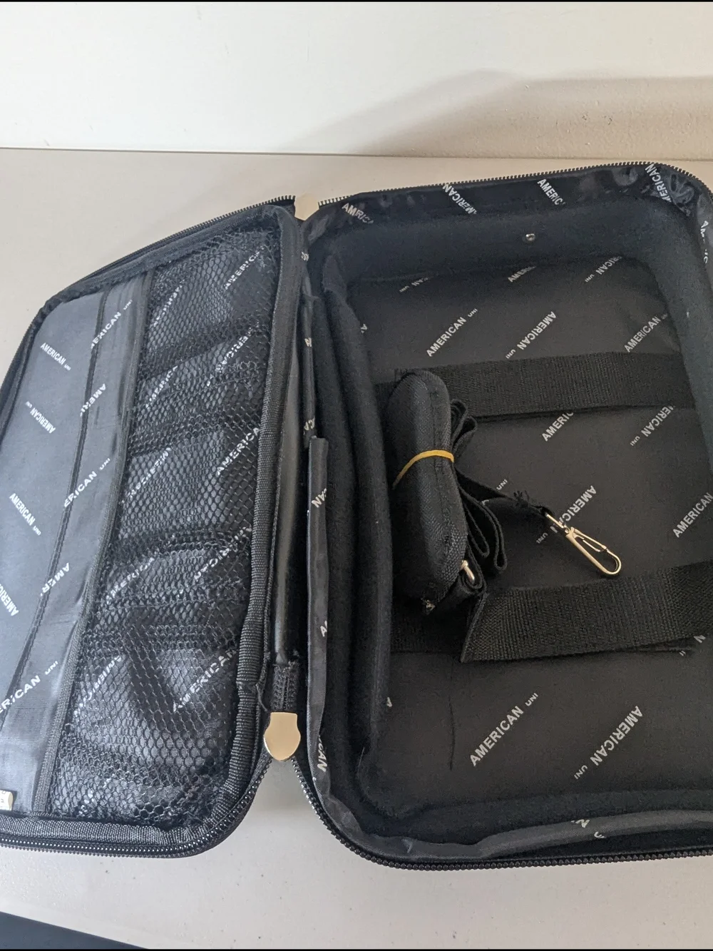 New with tags American Uni travel laptop and document organizer bag in black.